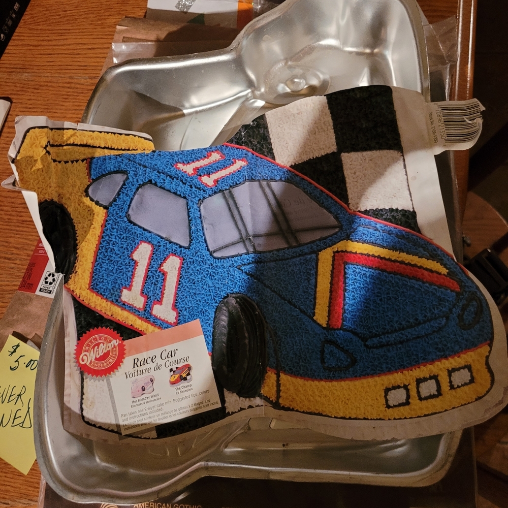 Wilton Race Car cake pan with recipe and instructions.